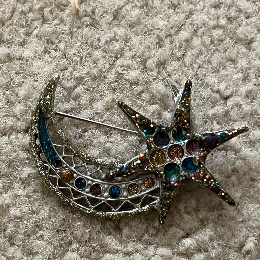 Shooting star broach.
